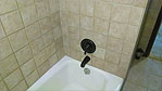 Ceramic tile makes a great bath surround that is easy to clean and looks good.