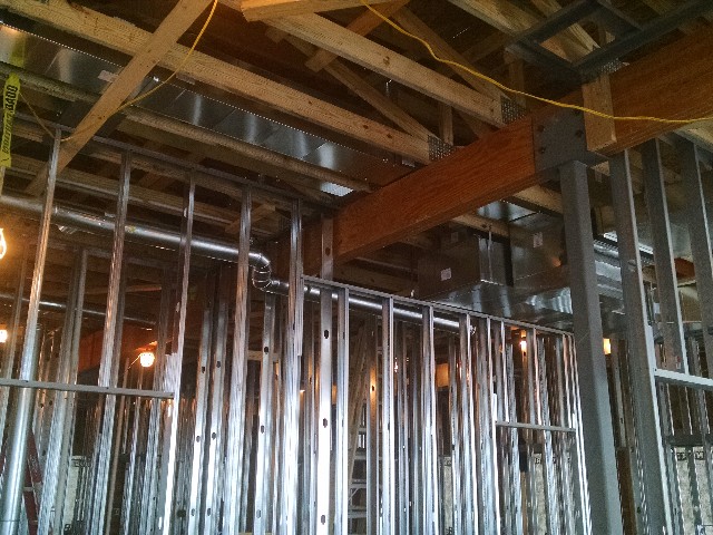 LVL beam that is holding up the trusses of commercial building
